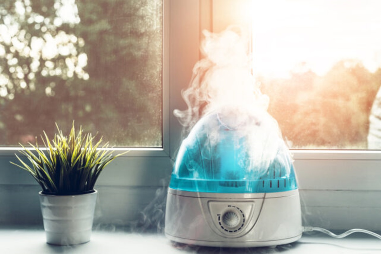 Air,Humidifier,During,Work.,The,White,Humidifier,Moistens,Dry,Air.
